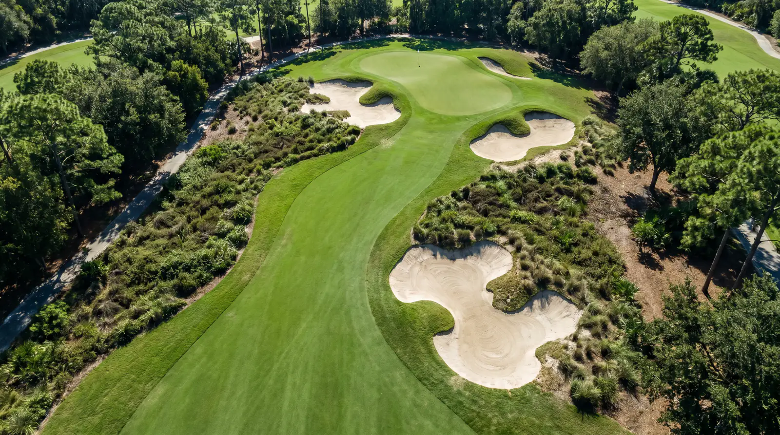 Aerial view of a challenging golf course layout demanding accurate ball striking