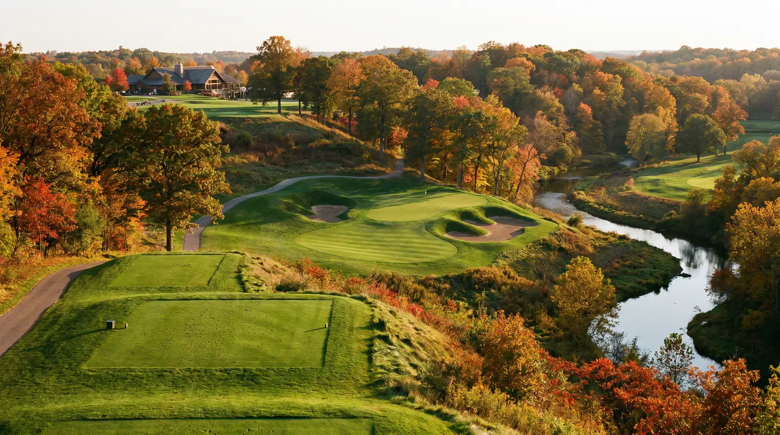 Scenic view of a championship golf course showing elevation changes and distinctive bunkering