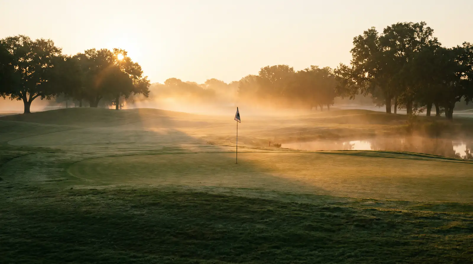 Golf course early morning with still conditions before the afternoon wind arrives